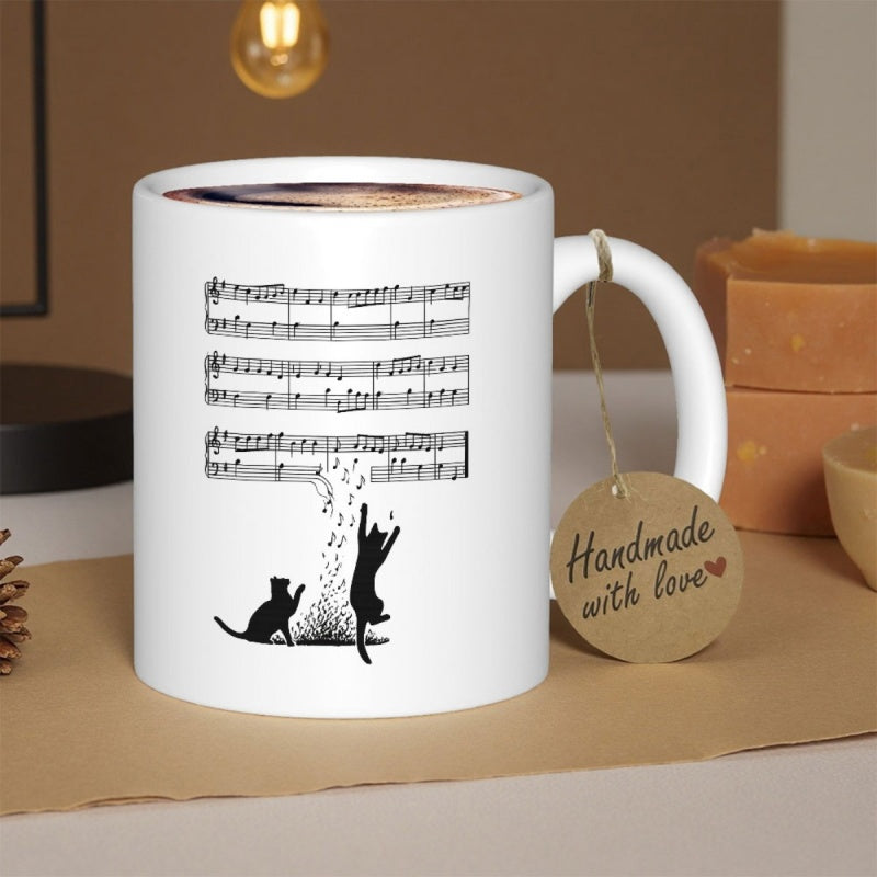Tailorly White Ceramic 11 oz Mug - Musical Staff Notes Floating Towards Playful Black Silhouettes Of Jumping Cat