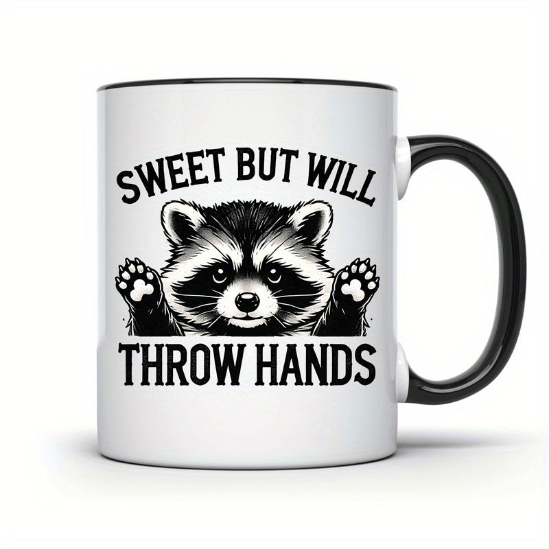 Tailorly Black Accent 11 oz Mug - funny raccoon with text "sweet but will throw hands"