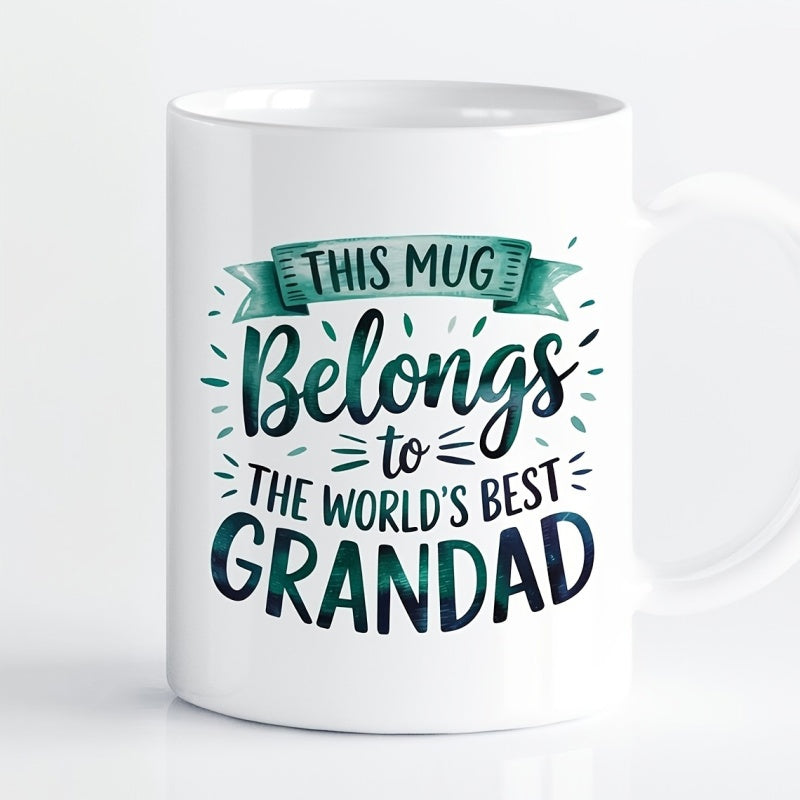Tailorly White Ceramic 11 oz Mug - This Mug Belongs To The Worlds Best Grandad Teal Ribbon Banner With Decorative Accents And Artistic Script Lettering Mug