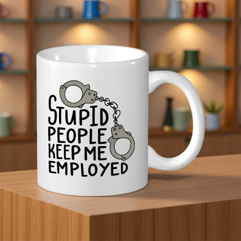 Tailorly White Ceramic 11 oz Mug - Stupid People Keep Me Employed Linked Metallic Restraints With Detailed Chain Links Floating Beside Bold Wording Handcuffs