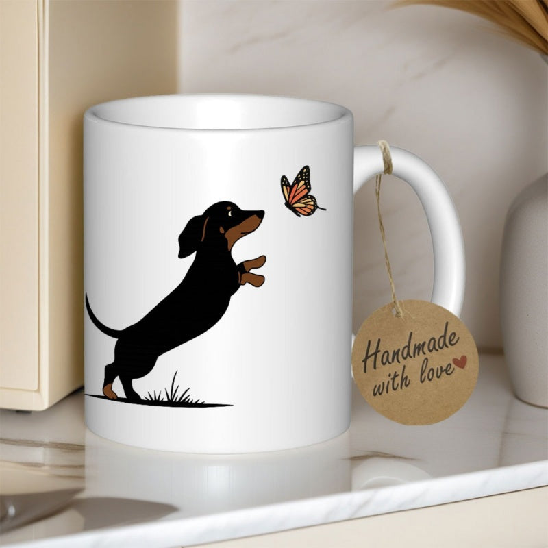 Tailorly White Ceramic 11 oz Mug - Handmade With Love Playful Black Dachshund Puppy Jumping Toward A Colorful Fluttering Garden Butterfly Dachshund
