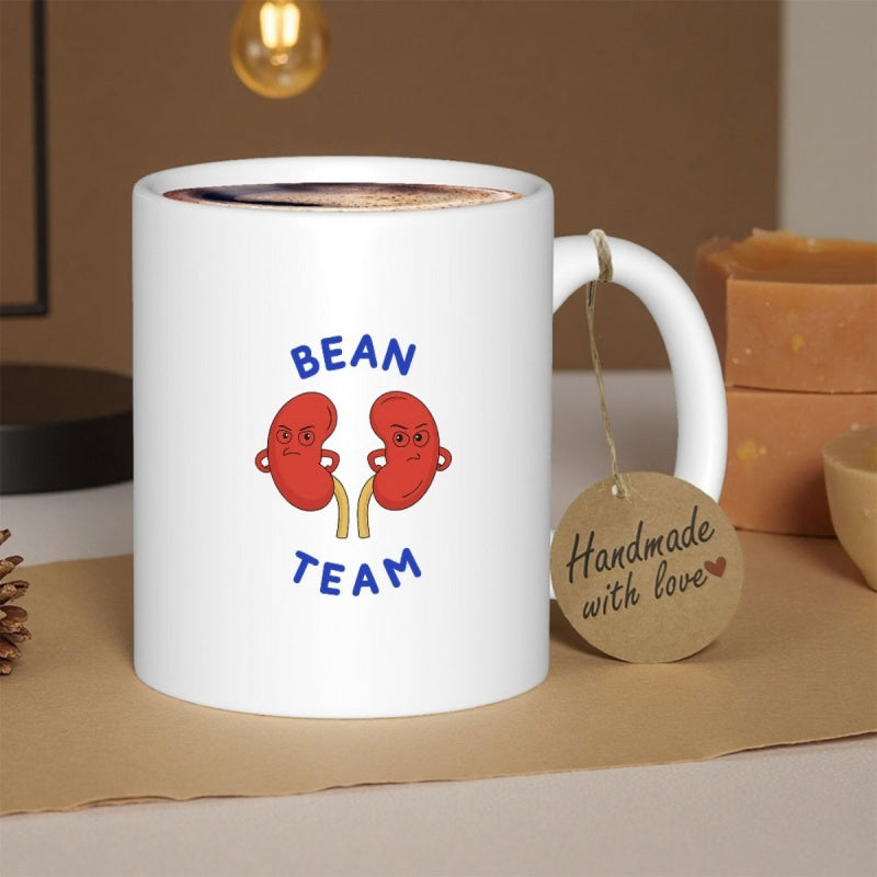 Tailorly White Ceramic 11 oz Mug - Bean Team Two Smiling Red Cartoon Kidney Characters Facing Each Other On White Kidney