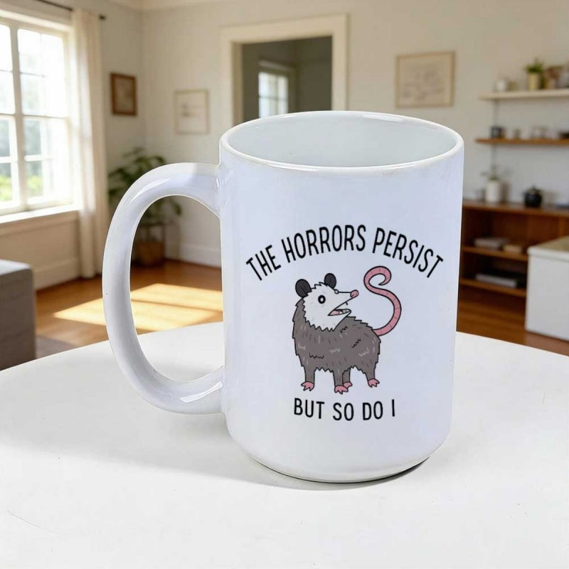 Tailorly White Ceramic 11 oz Mug - The Horrors Persist But So Do I Quirky Hand Drawn Sitting Marsupial With A Curly Pink Tail Opossum