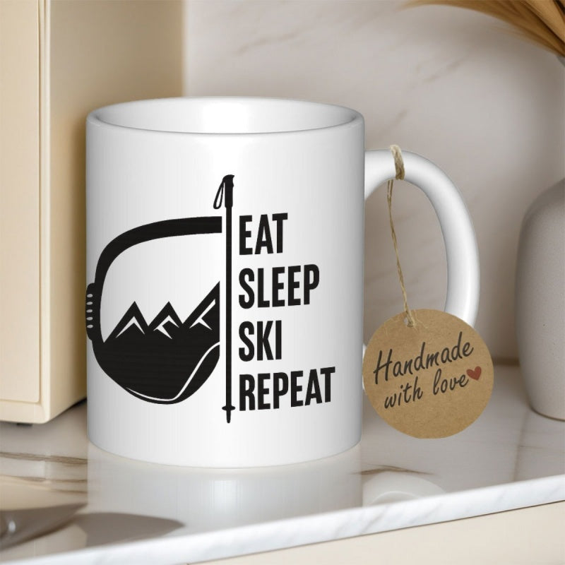 Tailorly White Ceramic 11 oz Mug - Eat Sleep Ski Repeat Minimalist Black Mountain Peaks Inside A Ski Goggle Frame With Pole Mountain