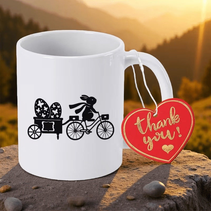 Tailorly White Ceramic 11 oz Mug - Thank You Black Silhouette Riding Bicycle Pulling Cart Filled With Decorative Easter Eggs Rabbit