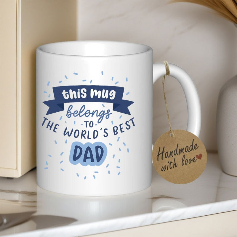 Tailorly White Ceramic 11 oz Mug - This Mug Belongs To The World Best Dad Simple White Ceramic Vessel With Blue Decorative Text And Tiny Confetti Mug