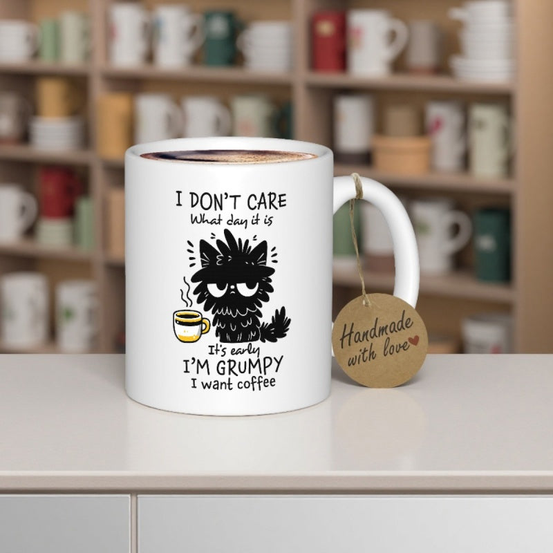 Tailorly White Ceramic 11 oz Mug - I Dont Care What Day It Is Its Early Im Grumpy I Want Coffee Disheveled Grumpy Black Animal Holding A Hot Steaming Cup Of