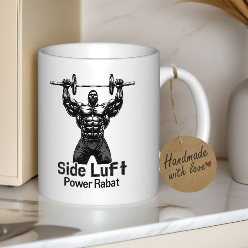 Tailorly White Ceramic 11 oz Mug - Side Luft Power Rabat Strong Muscular Silhouette Lifting Heavy Barbell Above Head During Intense Workout Bodybuilder