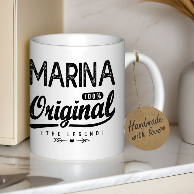 Tailorly White Ceramic 11 oz Mug - Marina Original The Legend Featuring Distressed Text Style Combined With A Heart Arrow Lettering
