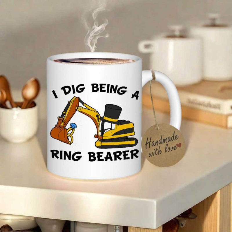 Tailorly White Ceramic 11 oz Mug - I Dig Being A Ring Bearer Yellow Construction Digger Wearing A Black Top Hat Holding Ring Excavator