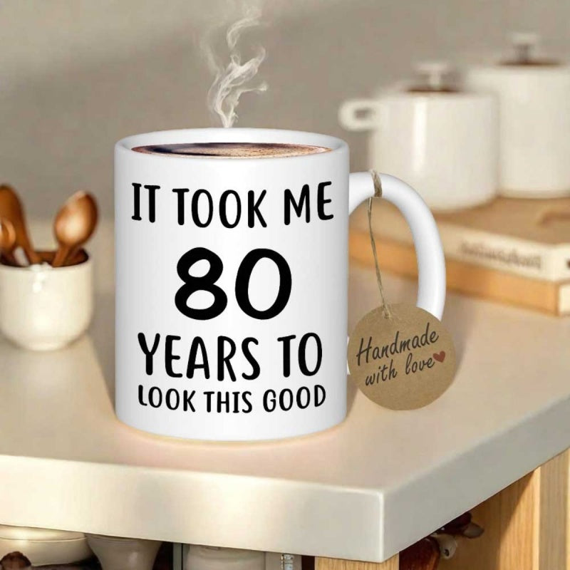 Tailorly White Ceramic 11 oz Mug - It Took Me 80 Years To Look This Good Bold Black Typography Printed On A Clean Minimalist