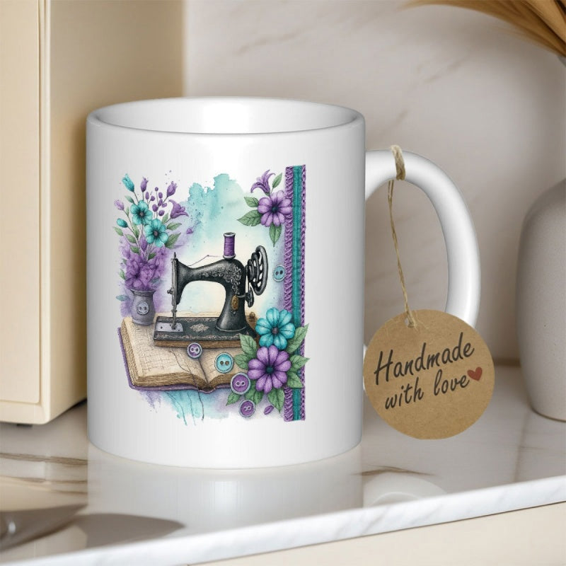 Tailorly White Ceramic 11 oz Mug - Handmade With Love Vintage Sewing Machine Resting On Open Book Among Vibrant Watercolor Flowers Machine