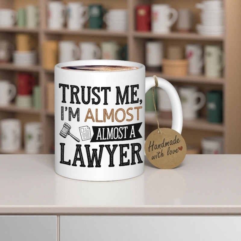 Tailorly White Ceramic 11 oz Mug - Trust Me I'm Almost A Lawyer Simple Bold Black Lettering With Iconic Legal Document And Wooden Gavel