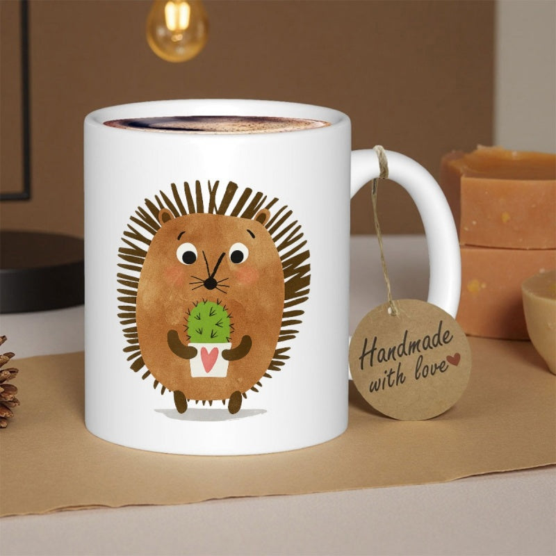 Tailorly White Ceramic 11 oz Mug - Handmade With Love Cute Tiny Brown Character Carrying A Small Potted Green Heart Cactus Hedgehog