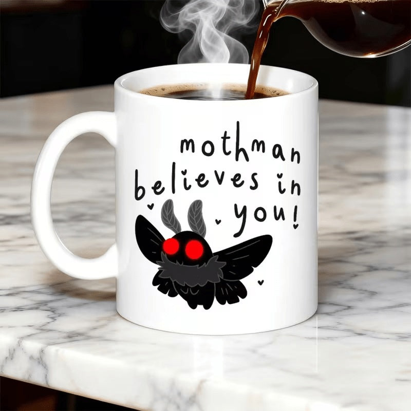 Tailorly White Ceramic 11 oz Mug - Mothman Believes In You Cute Dark Winged Cryptid With Glowing Red Eyes And Hearts Mothman