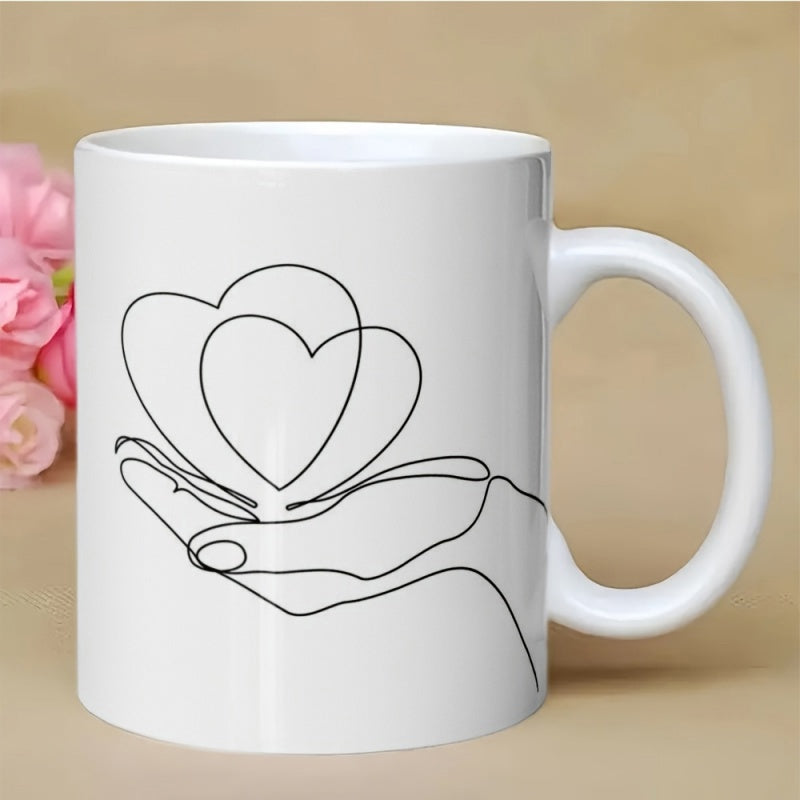 Tailorly White Ceramic 11 oz Mug - Minimalist Continuous Line Drawing Featuring A Gentle Hand Holding Delicate Overlapping Hearts