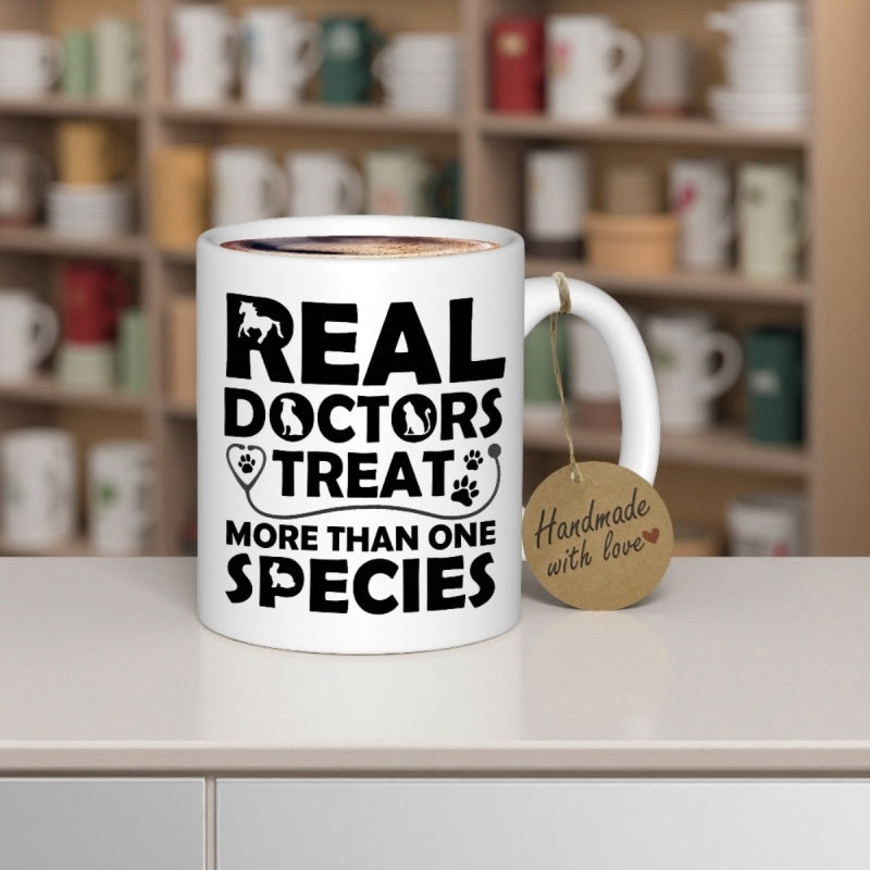 Tailorly White Ceramic 11 oz Mug - Real Doctors Treat More Than One Species Bold Minimalist Typography Combined With Veterinary Icons And Medical Symbols Mug