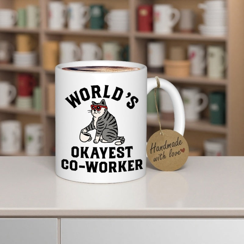 Tailorly White Ceramic 11 oz Mug - Worlds Okayest Co Worker Funny Striped Tabby Cat Wearing Red Sunglasses Holding A Tiny Cup Cat
