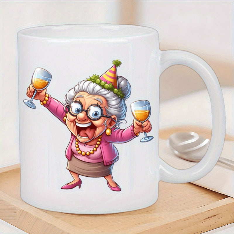 Tailorly White Ceramic 11 oz Mug - Cheerful Elderly Woman Wearing Party Hat Holding Two Drinks Celebrating Joyfully Grandma