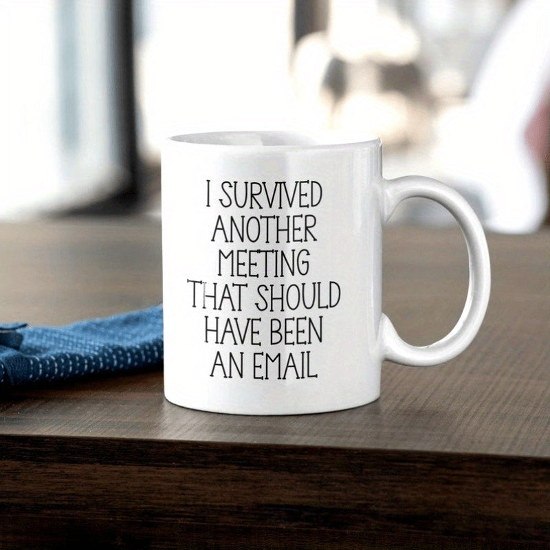 Tailorly White Ceramic 11 oz Mug - I Survived Another Meeting That Should Have Been An Email Minimalist White Ceramic Vessel Standing On A Dark Wooden Surface Mug