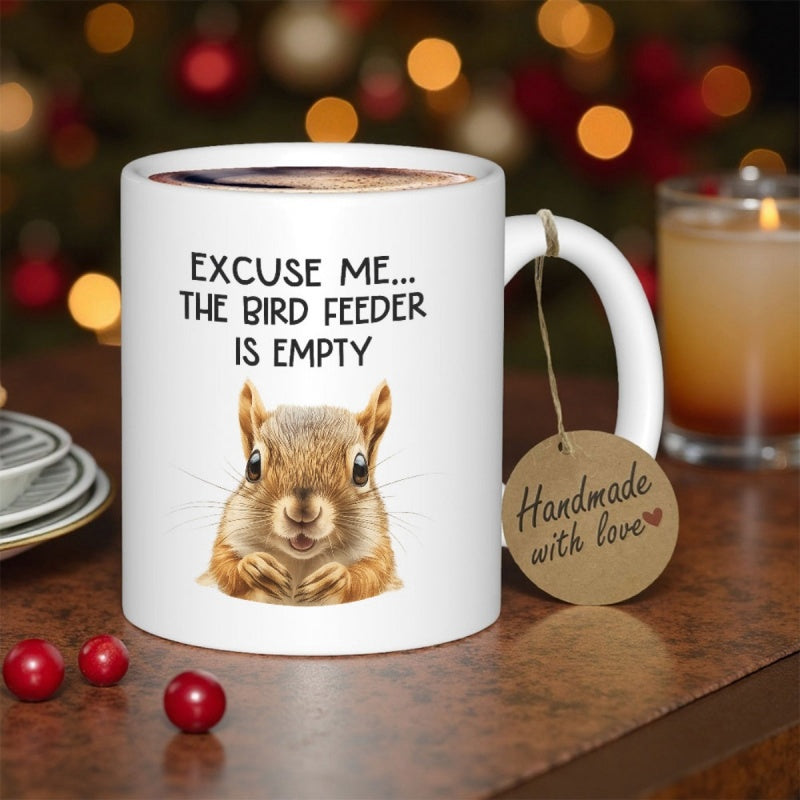 Tailorly White Ceramic 11 oz Mug - Excuse Me The Bird Feeder Is Empty Cute Realistic Brown Squirrel Peeking From The Bottom Over A Plain Background Squirrel