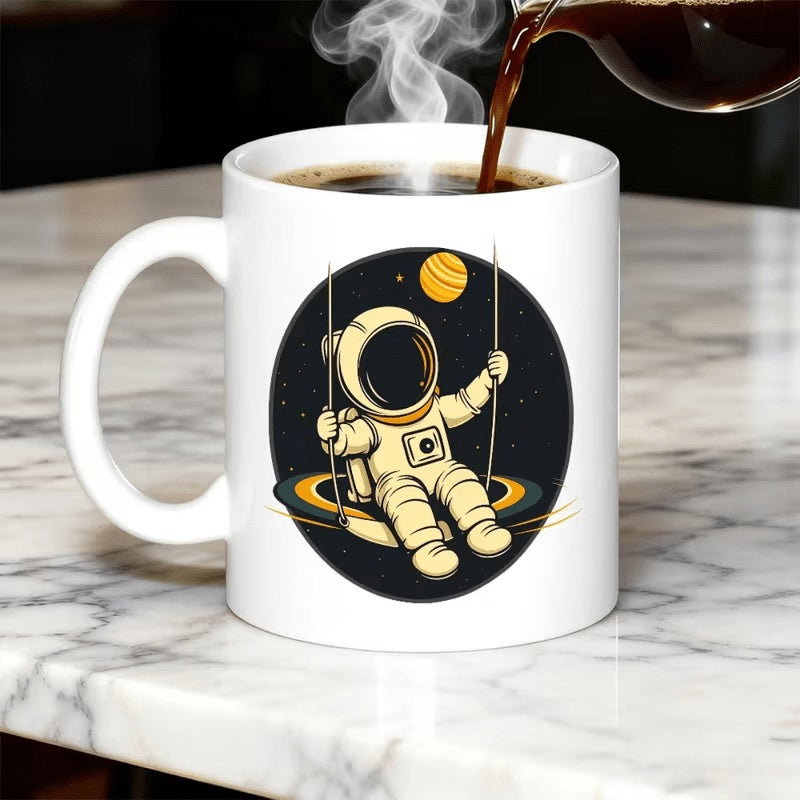 Tailorly White Ceramic 11 oz Mug - Whimsical Space Voyager Swinging Among Stars On A Glowing Planetary Ring Astronaut