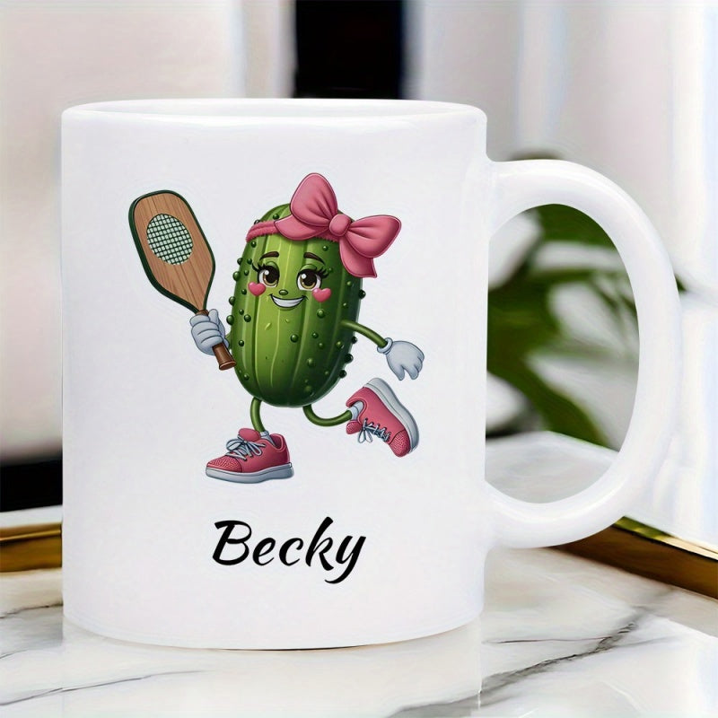 Tailorly White Ceramic 11 oz Mug - Becky Smiling Green Character Wearing Pink Sneakers And Holding A Paddle Pickle