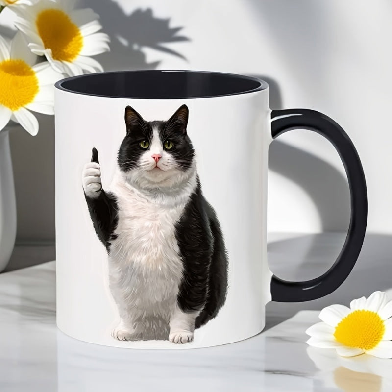 Tailorly Black Accent 11 oz Mug - cartoon drawing of a chubby black and white cat with a thumbs