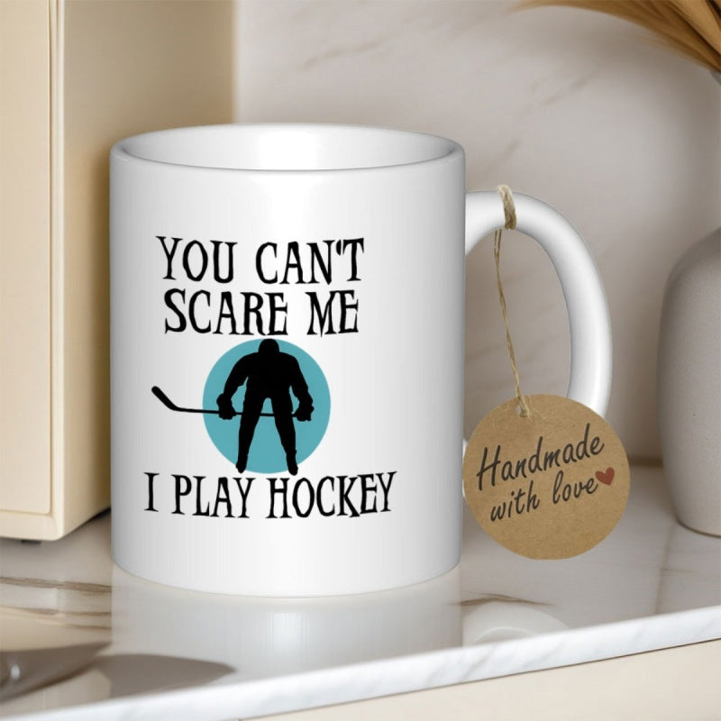 Tailorly White Ceramic 11 oz Mug - You Cant Scare Me I Play Hockey Dynamic Athlete Silhouette Standing Inside A Circular Blue Frame Hockey Player