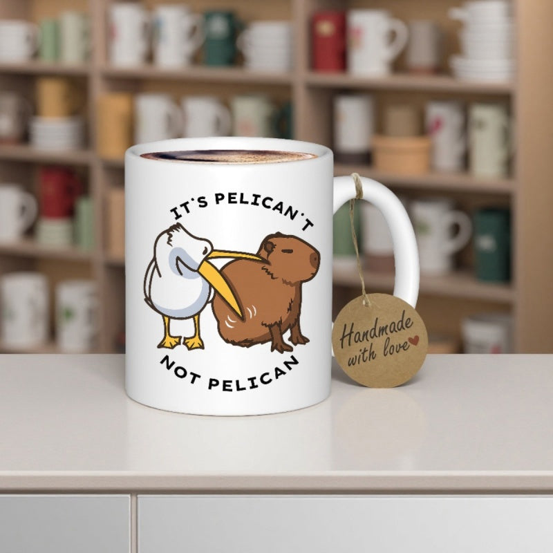 Tailorly White Ceramic 11 oz Mug - Its Pelicant Not Pelican Cartoon Pelican Biting The Back Of A Gentle Brown Mammal Capybara
