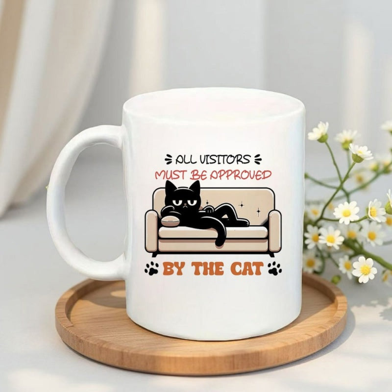 Tailorly White Ceramic 11 oz Mug - All Visitors Must Be Approved By The Cat Grumpy Black Cat Resting Comfortably On A Modern Minimalist Sofa Cat