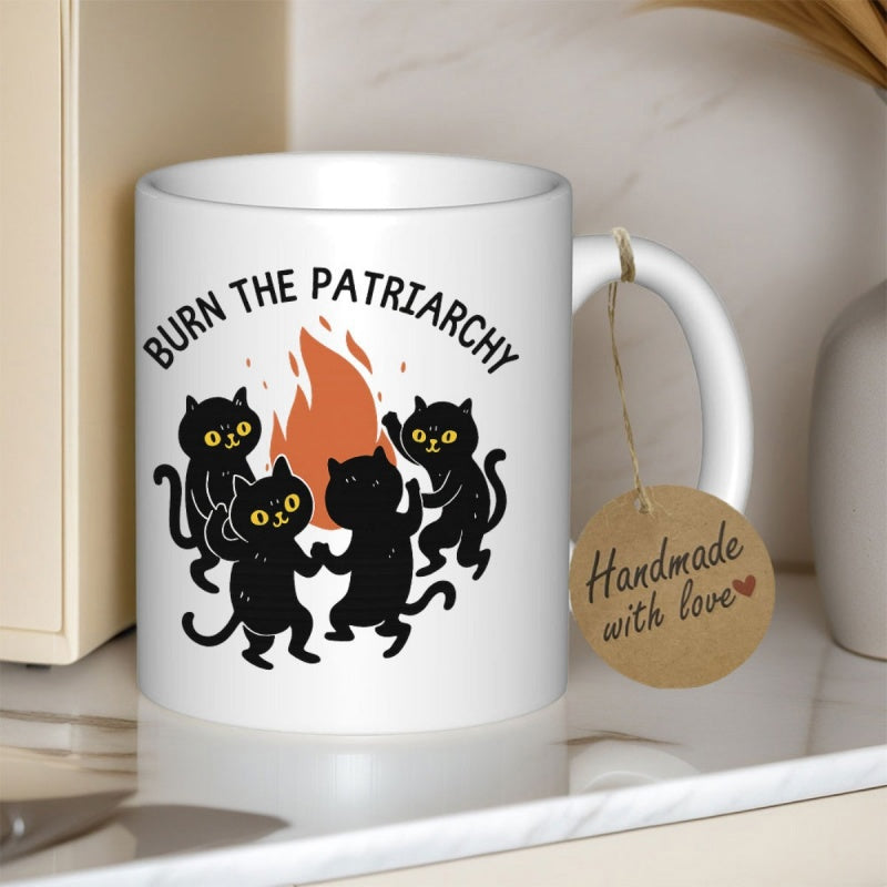 Tailorly White Ceramic 11 oz Mug - Burn The Patriarchy Four Playful Black Cats Dancing Around A Blazing Orange Bonfire Cat
