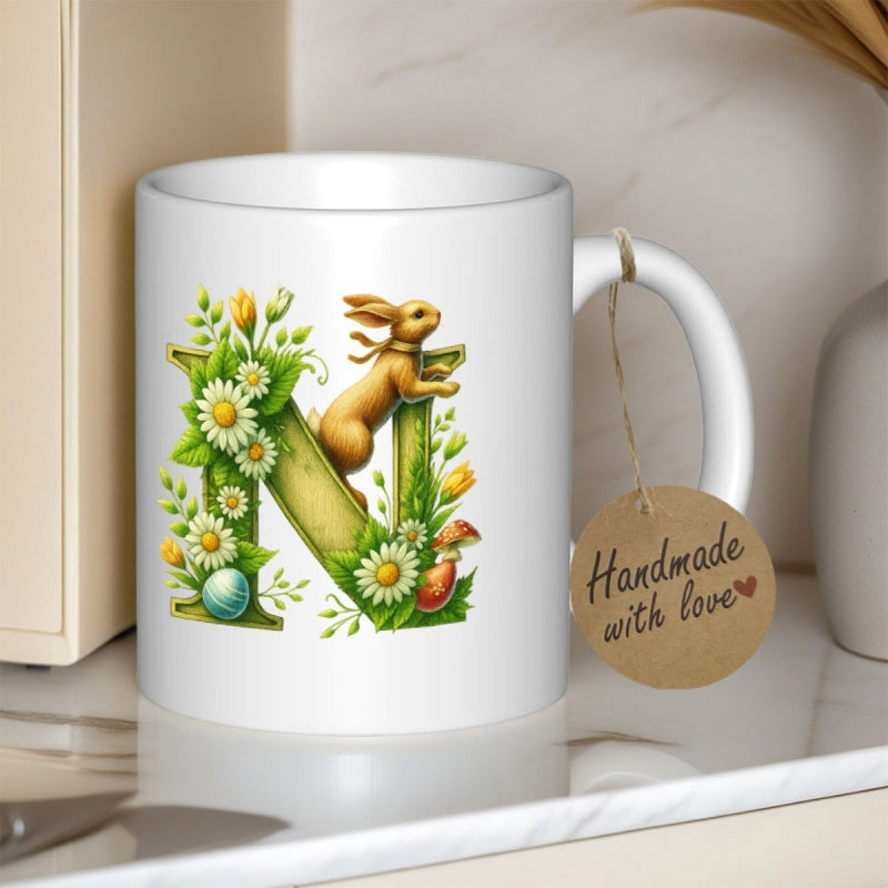 Tailorly White Ceramic 11 oz Mug - Handmade With Love Spring Floral Alphabet With Daisies Leaves And Painted Easter Eggs Rabbit