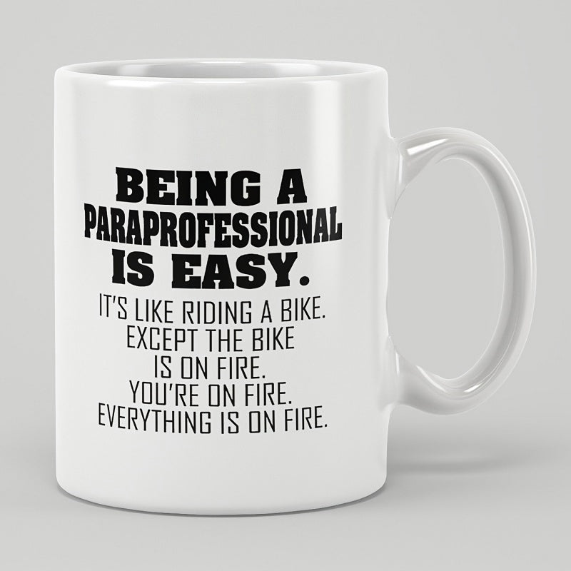 Tailorly White Ceramic 11 oz Mug - Being A Paraprofessional Is Easy It Is Like Riding A Bike Except The Bike Is On Fire You Are On Fire Everything Is On Fire