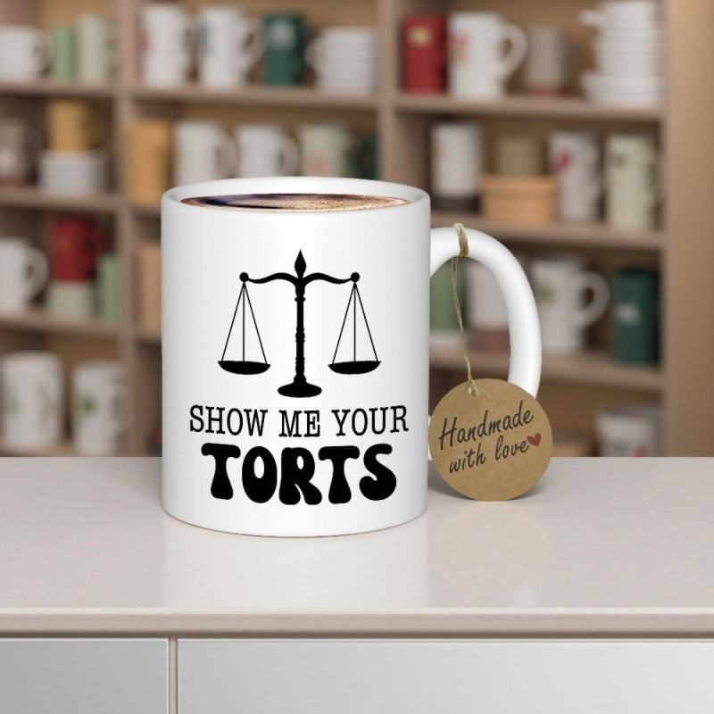 Tailorly White Ceramic 11 oz Mug - Show Me Your Torts Minimalist Symmetrical Black Scales Of Justice Centered Over Bold Script Scale