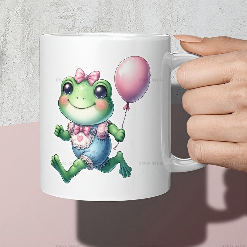 Tailorly White Ceramic 11 oz Mug - Adorable Little Green Character Holding A Pink Floating Balloon Frog