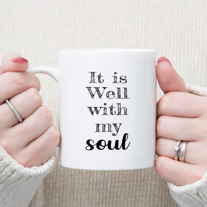 Tailorly White Ceramic 11 oz Mug - It Is Well With My Soul Minimalist White Ceramic Container Held By Gentle Hands With Decorative Rings Mug