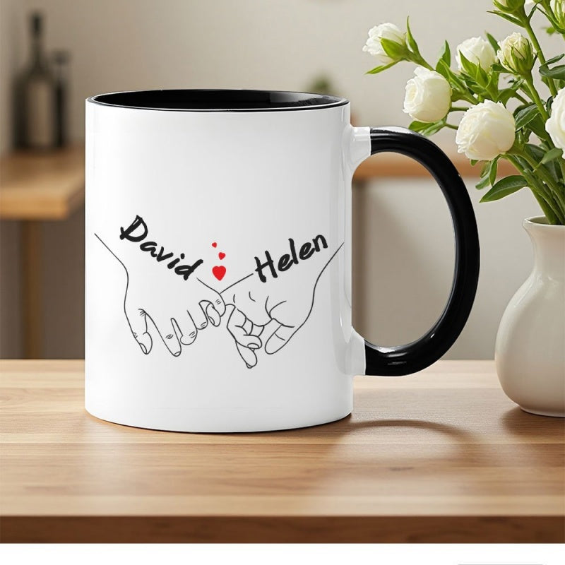 Tailorly Black Accent 11 oz Mug - couple holding hands with a red heart