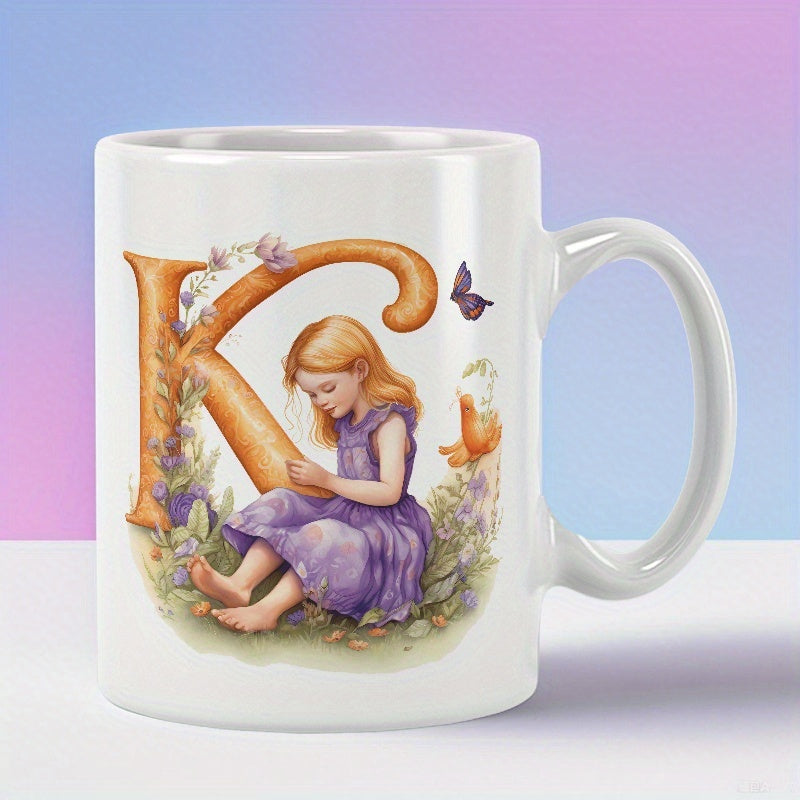 Tailorly White Ceramic 11 oz Mug - K Sitting Gracefully Among Flowers Beside A Large Golden Artistic Letter Girl