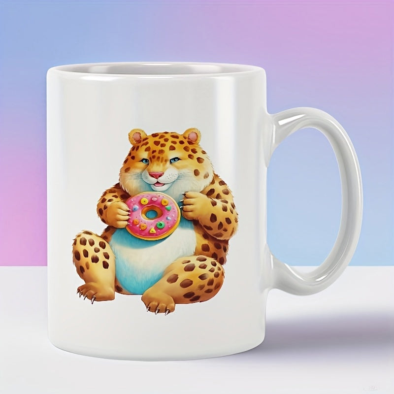 Tailorly White Ceramic 11 oz Mug - Chubby Spotted Leopard Sitting And Holding A Pink Frosted Sweet Donut Leopard