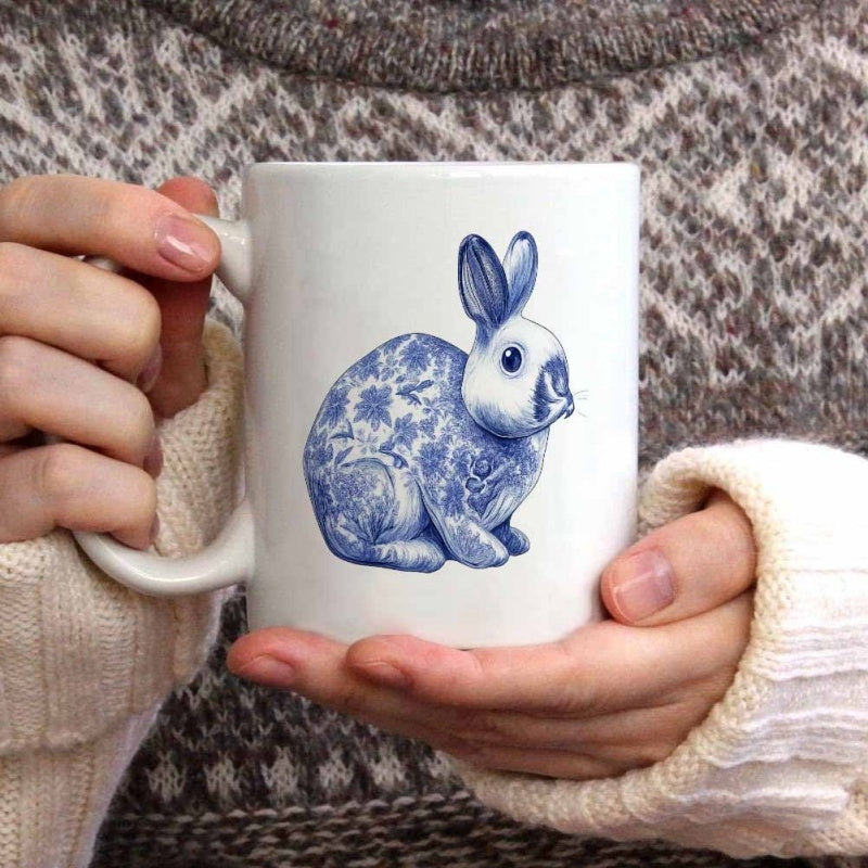 Tailorly White Ceramic 11 oz Mug - Intricate Blue Floral Patterns Decorating A Peaceful Sitting Porcelain Style Rabbit