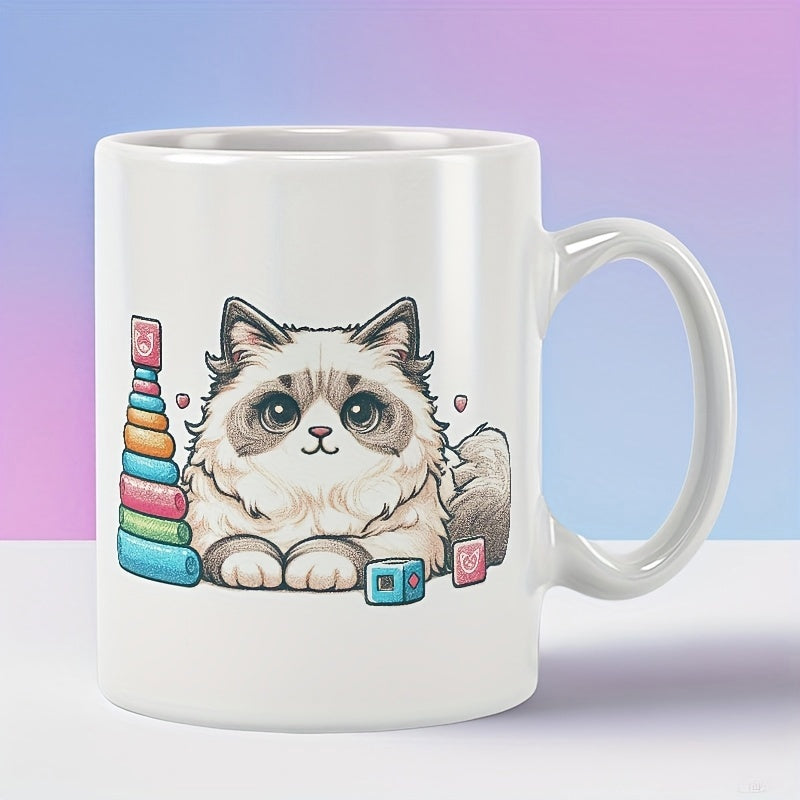 Tailorly White Ceramic 11 oz Mug - Adorable Fluffy Ragdoll Kitten Resting Beside Colorful Rainbow Toy Rings Cat