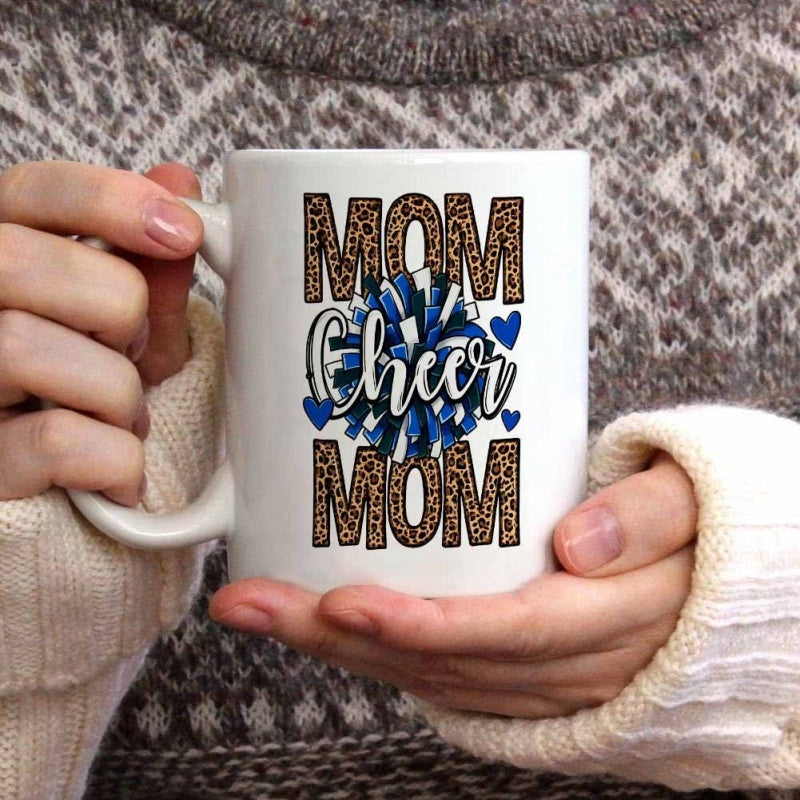 Tailorly White Ceramic 11 oz Mug - Cheer Mom Leopard Patterned Bold Letters Centered With A Vibrant Blue Pompom