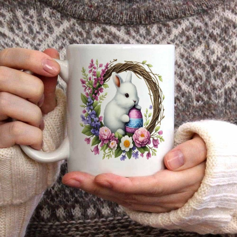 Tailorly White Ceramic 11 oz Mug - Adorable Fluffy White Bunny Holding Colorful Easter Egg Within Floral Wreath Rabbit