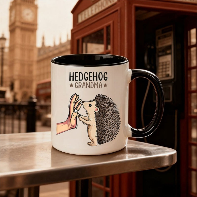 Tailorly Black Accent 11 oz Mug - cartoon hedgehog illustration with text "grandma" and brown stars