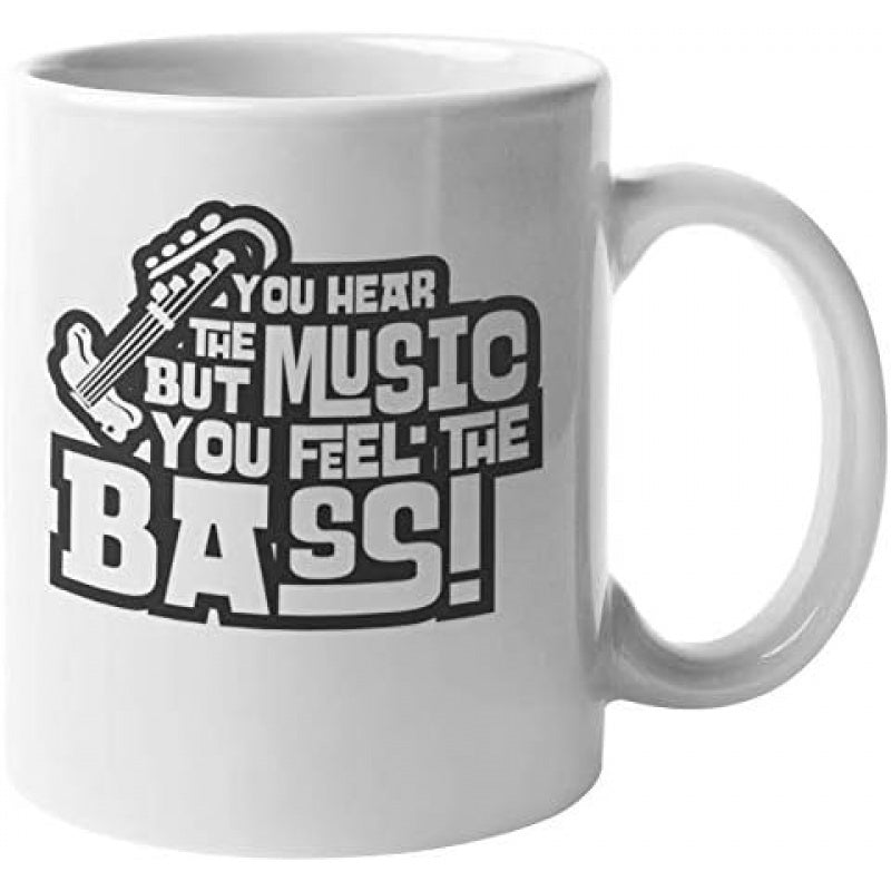 Tailorly White Ceramic 11 oz Mug - You Hear The Music But You Feel The Bass Stylized Black Guitar Headstock Silhouette Among Bold Rhythmic Typography Bass