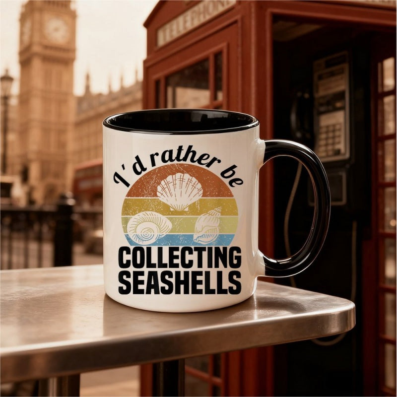Tailorly Black Accent 11 oz Mug - nautical shell， scallop， conch shells， text "rather be collecting seashells"