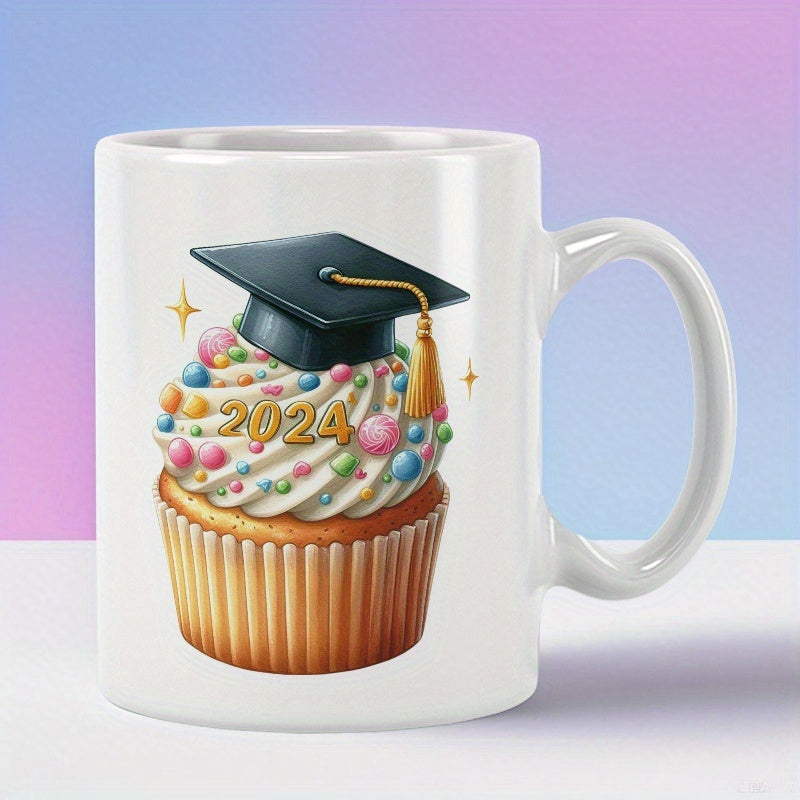 Tailorly White Ceramic 11 oz Mug - 2024 Graduation Cap With Golden Tassel Atop A Festive Sprinkled Cupcake