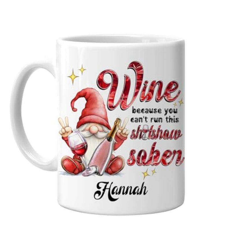 Tailorly White Ceramic 11 oz Mug - Wine Because You Can't Run This Shitshow Sober Hannah Festive Sitting Red Hat Character Holding Wine Bottle And Glass Gnome