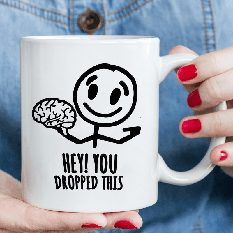 Tailorly White Ceramic 11 oz Mug - Hey You Dropped This Minimalist Cartoon Character Holding A Human Brain Stickman